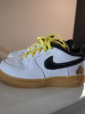 Nike Size 9c Kids' White Sneakers with Black Swoosh, Gum Sole, & Yellow Laces